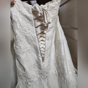 This is a Essence of Australia wedding gown, size 22, with a corset back, ivory
